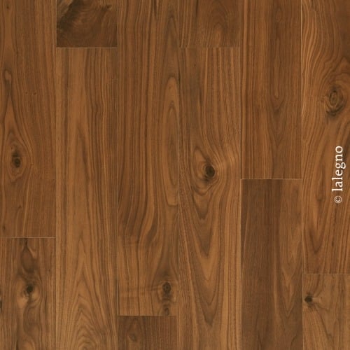Plancher en bois brun foncé type noyer, texture de lames verticales avec veinage naturel et nœuds. Texte: © lalegno.